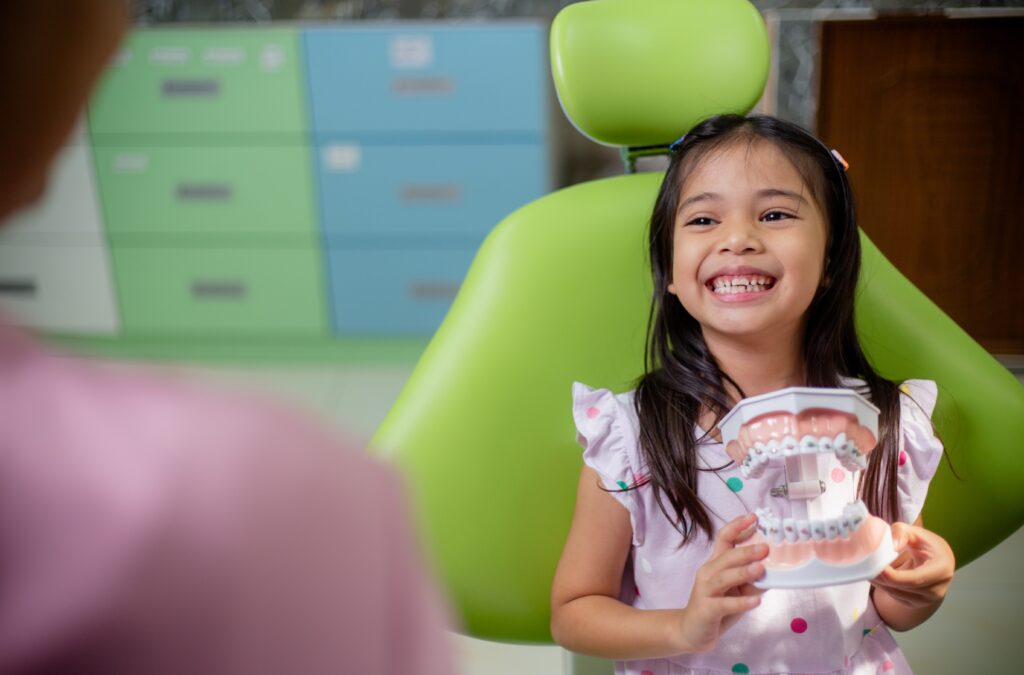 Lakeside smile Little Asian girls teeth are healthy in the Dental office. Dental care, Dentist care.